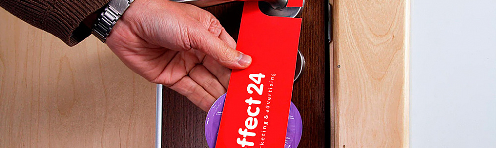 Изготовление и размещение рекламы на дверные ручки (дорхенгер) в жилых домах